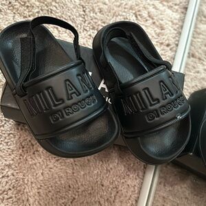 Never worn Baby slides